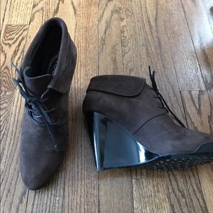 Tod's brown booties. 8